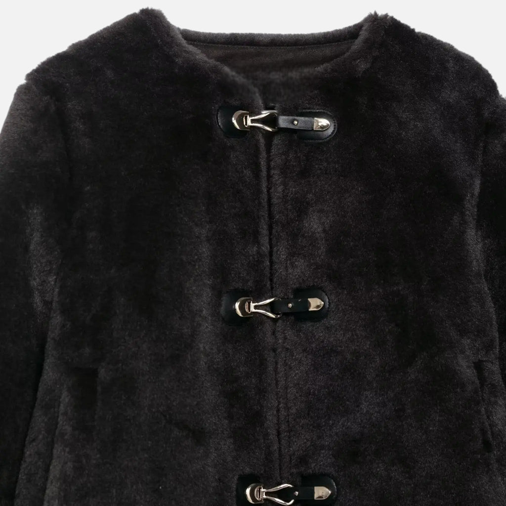 Chaqueta de mujer con botones de palanca y piel sintética
