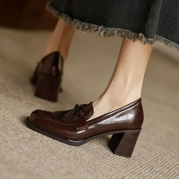 Mocasines con tacón bloque y borlas