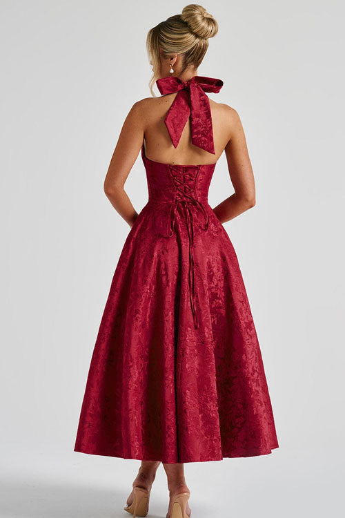 Vestido largo jacquard con escote en V y cuello halter
