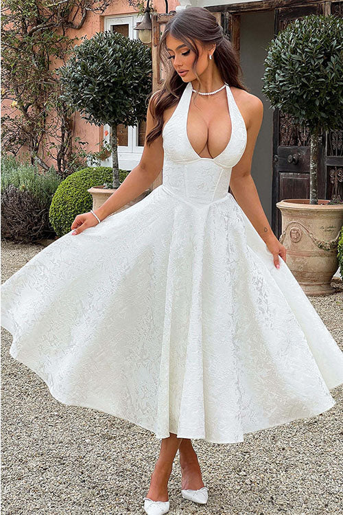 Vestido largo jacquard con escote en V y cuello halter