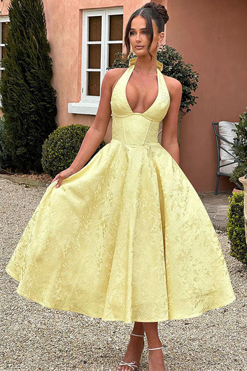 Vestido largo jacquard con escote en V y cuello halter
