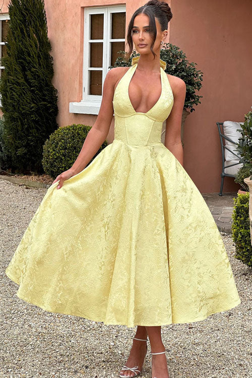 Vestido largo jacquard con escote en V y cuello halter