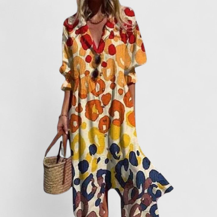 Abito Maxi Boho Svasato con Linea Fluttuante