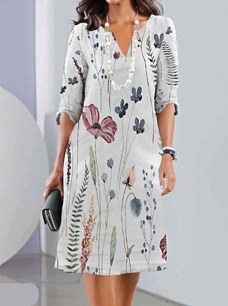 Vestido corto floral con capas