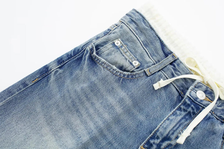 Jeans clásicos y elegantes de mujer de tiro medio con pierna recta y cordones