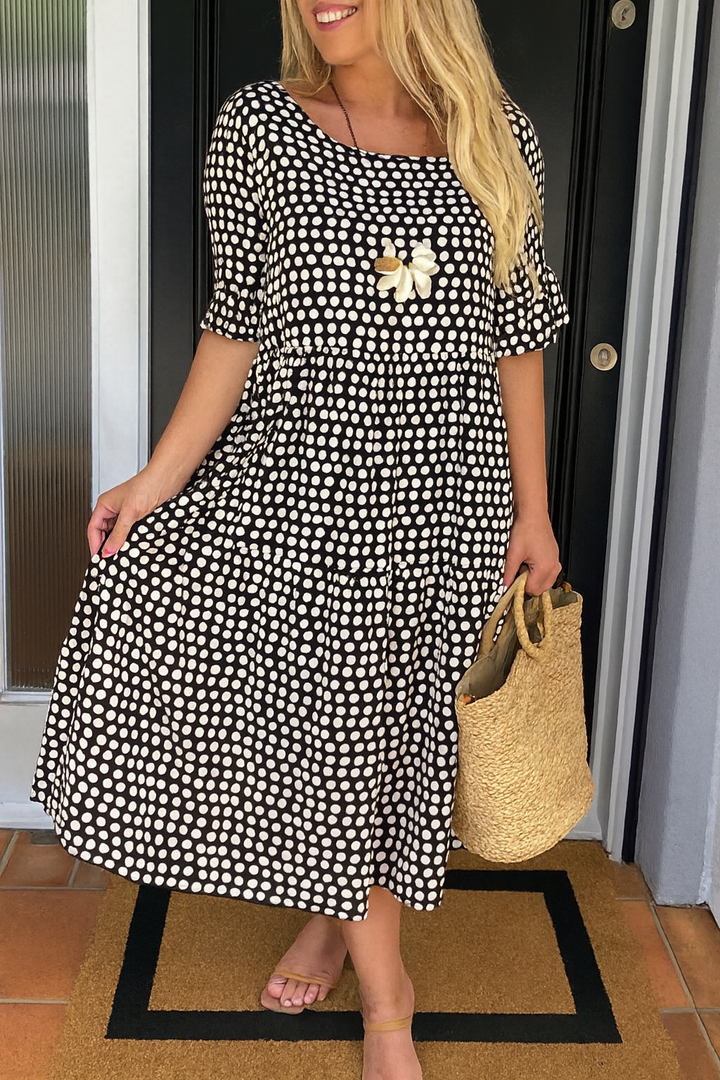 Vestido midi de manga corta con ajuste holgado