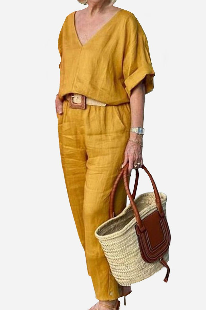 Conjunto de blusa de manga murciélago con escote en V y pantalones de pierna recta