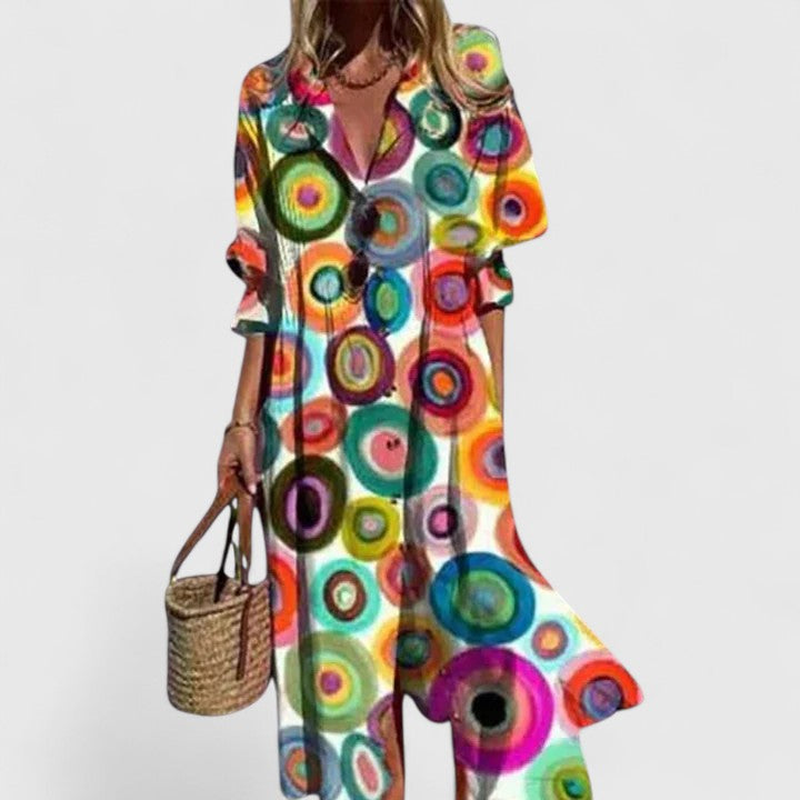 Abito Maxi Boho Svasato con Linea Fluttuante