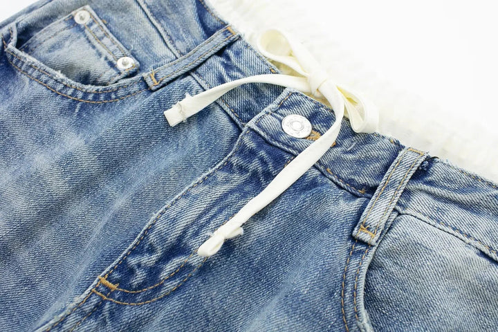 Jeans clásicos y elegantes de mujer de tiro medio con pierna recta y cordones