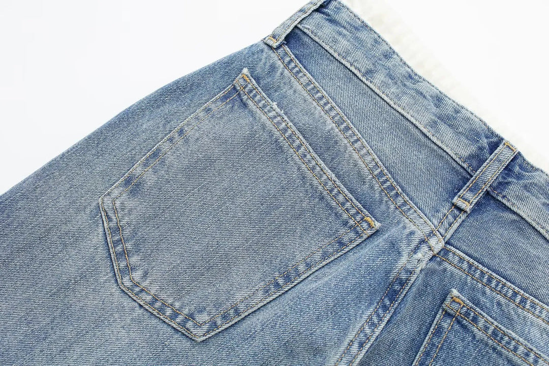 Jeans clásicos y elegantes de mujer de tiro medio con pierna recta y cordones