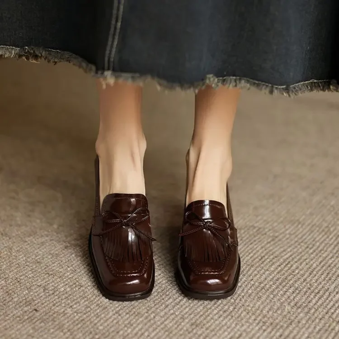 Mocasines con tacón bloque y borlas
