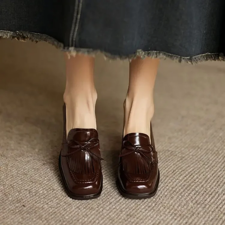Mocasines con tacón bloque y borlas