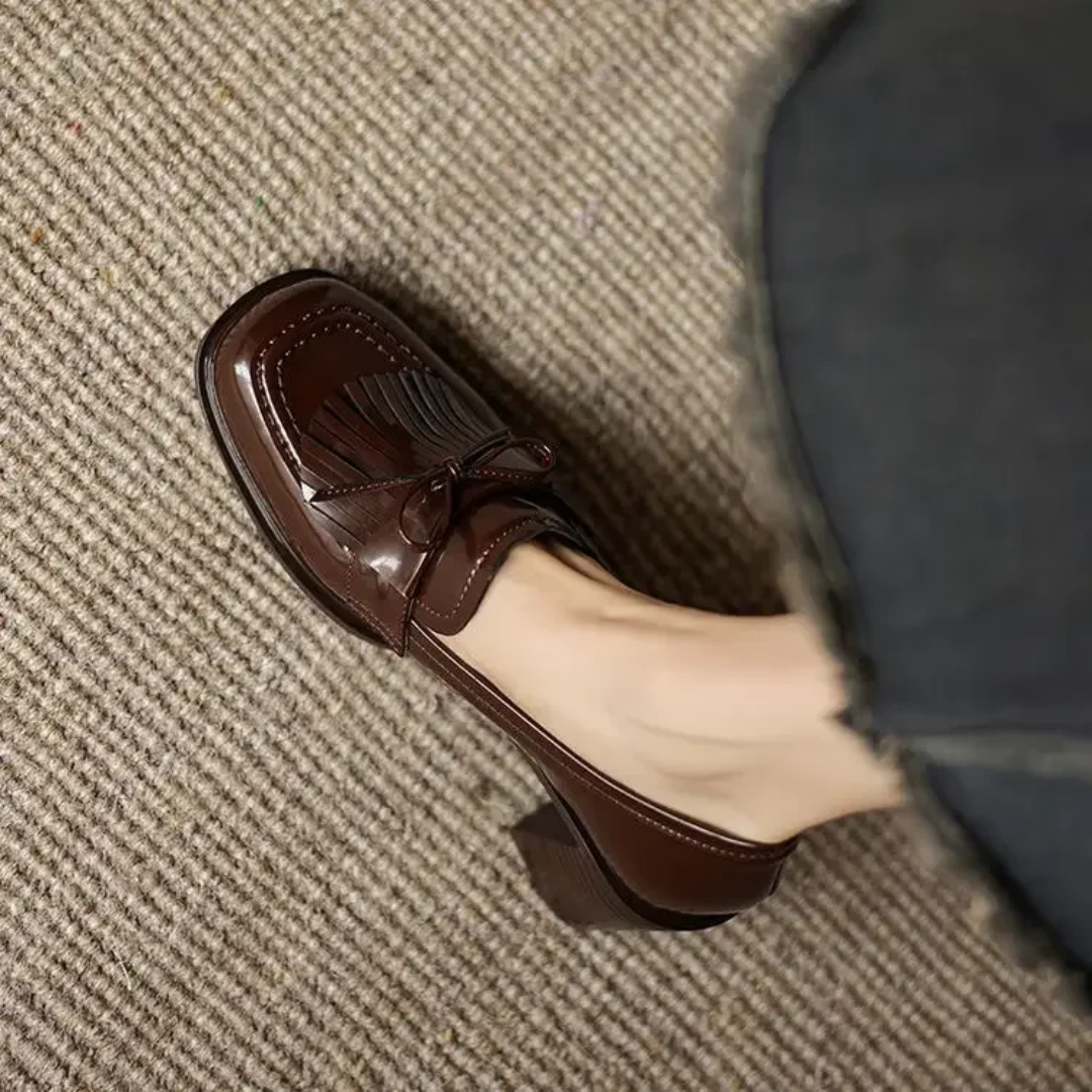 Mocasines con tacón bloque y borlas
