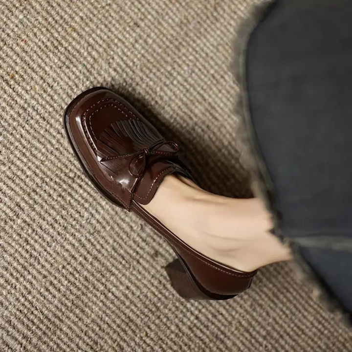 Mocasines con tacón bloque y borlas