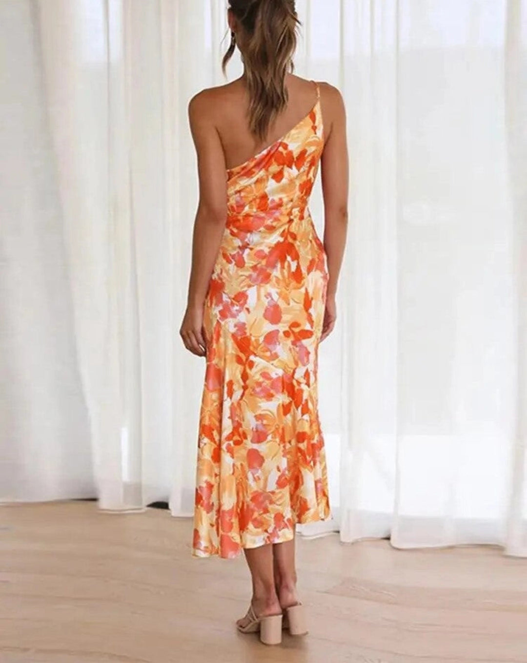 Vestido largo asimétrico con estampado floral