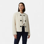 Chaqueta de mujer con botones de palanca y piel sintética