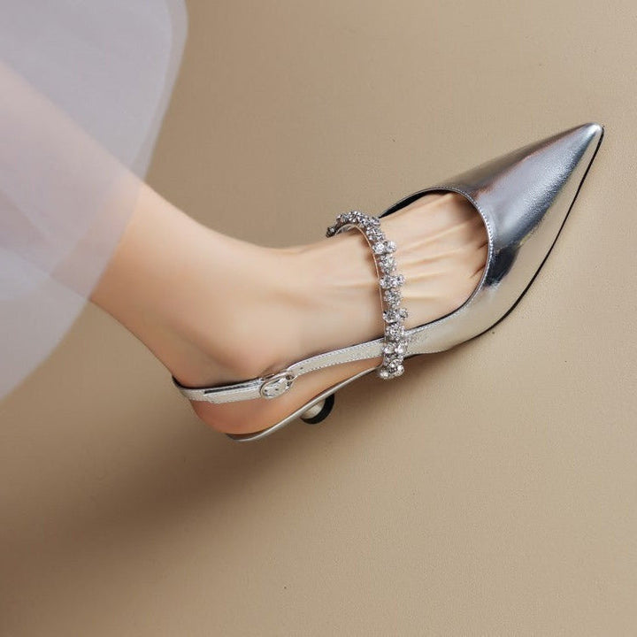 Décolleté slingback con cinturino di cristallo