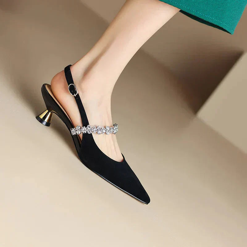 Décolleté slingback con cinturino di cristallo