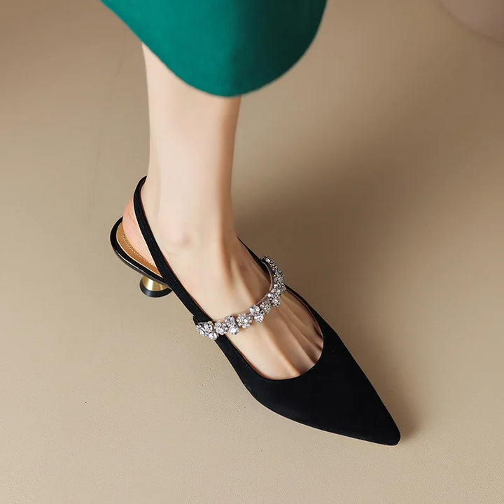 Décolleté slingback con cinturino di cristallo