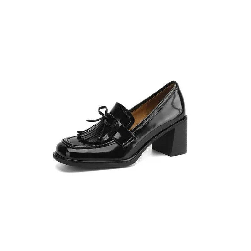 Mocasines con tacón bloque y borlas