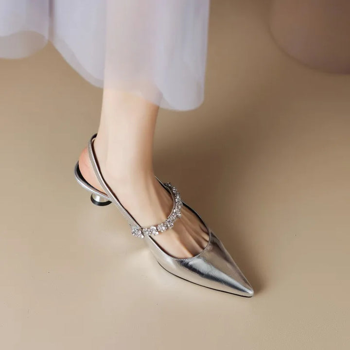 Décolleté slingback con cinturino di cristallo