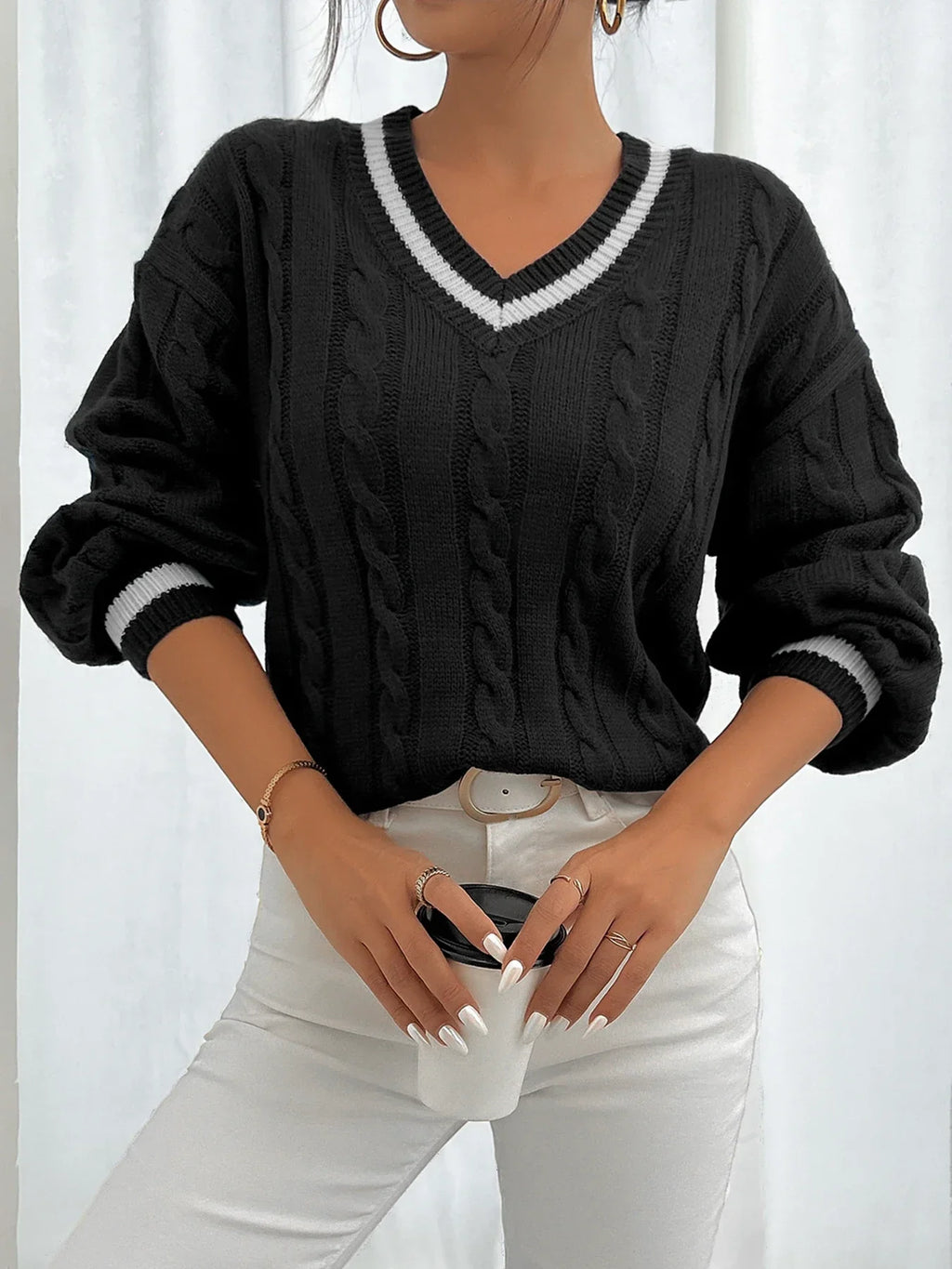 Maglione a spalla con motivo floreale intrecciato