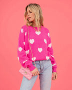 Maglione oversize con motivo a cuori rosa acceso