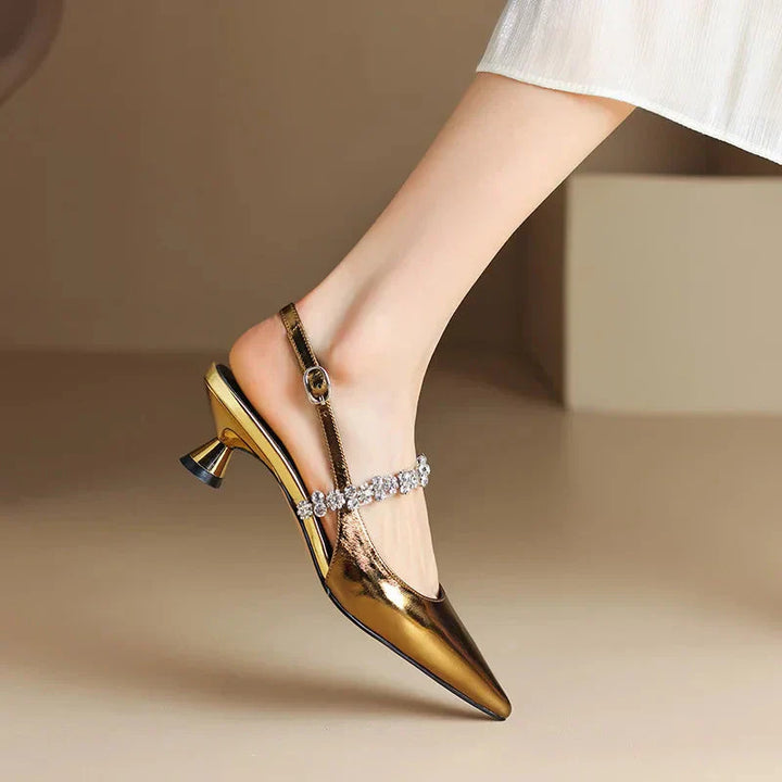 Décolleté slingback con cinturino di cristallo