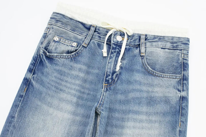 Jeans clásicos y elegantes de mujer de tiro medio con pierna recta y cordones