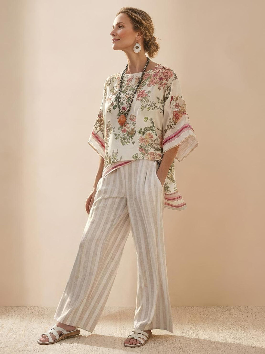 Conjunto de camiseta a rayas y pantalones de pierna ancha