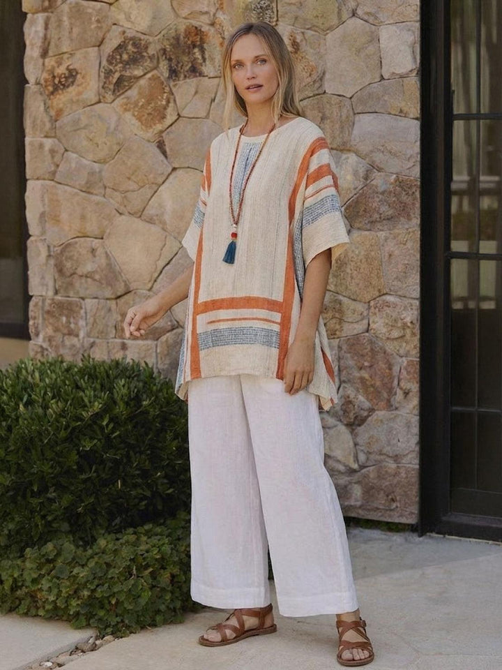Conjunto de camiseta a rayas y pantalones de pierna ancha