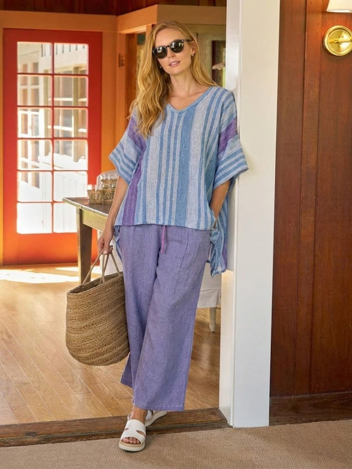 Conjunto de camiseta a rayas y pantalones de pierna ancha
