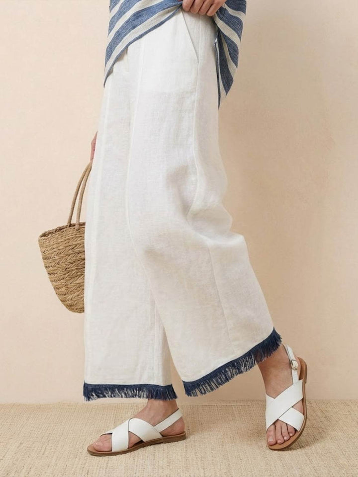 Conjunto de camiseta a rayas y pantalones de pierna ancha