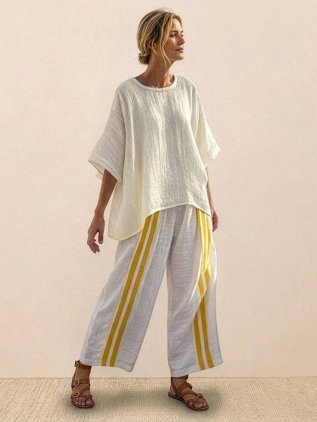 Conjunto de camiseta a rayas y pantalones de pierna ancha