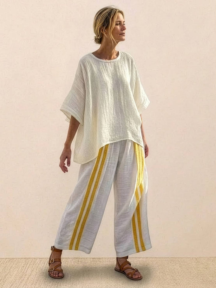 Conjunto de camiseta a rayas y pantalones de pierna ancha