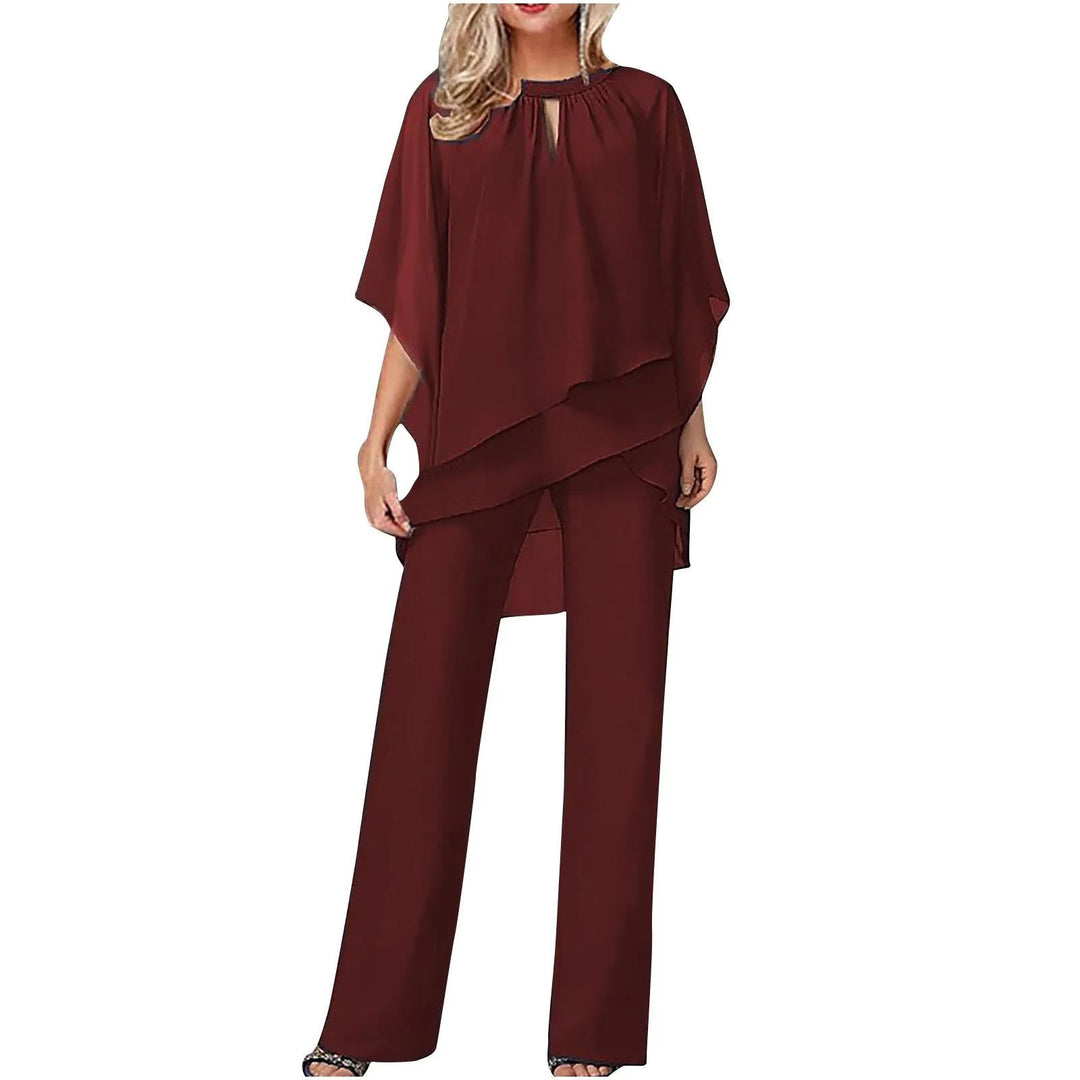 Traje de pantalón con mangas murciélago y sobreposición de gasa