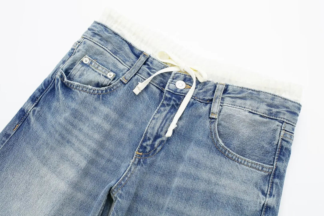 Jeans clásicos y elegantes de mujer de tiro medio con pierna recta y cordones