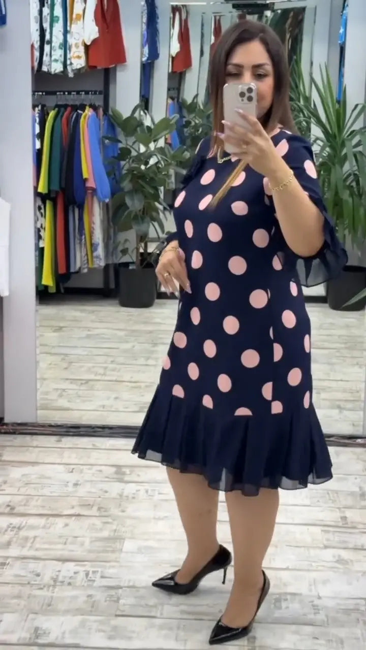 Vestido midi plisado con lunares
