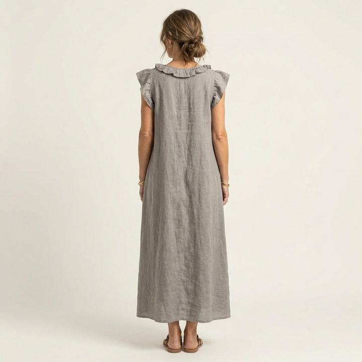 Vestido largo de lino con escote en V y volantes