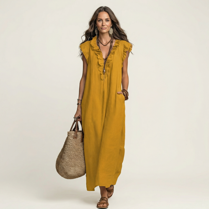 Vestido largo de lino con escote en V y volantes