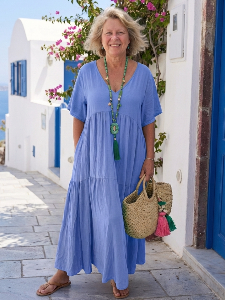 Vestido largo de manga corta con volantes