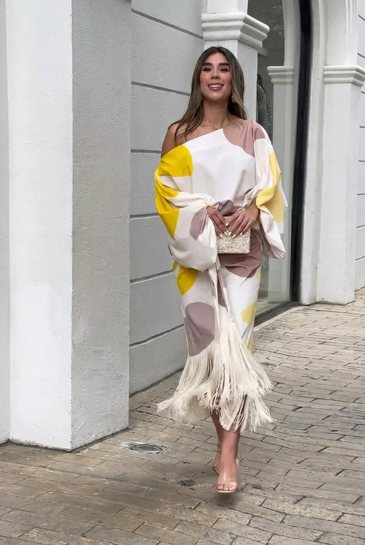 Conjunto midi con flecos y un solo hombro
